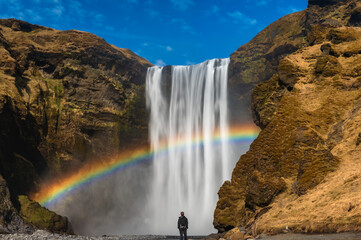 Picturesque of rainbow at Skogafoss waterfall in most popular tourist attraction in Iceland