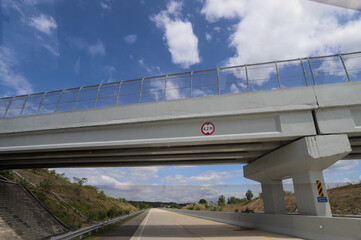 Obraz premium Road trip view from the car asphalt and blue sky