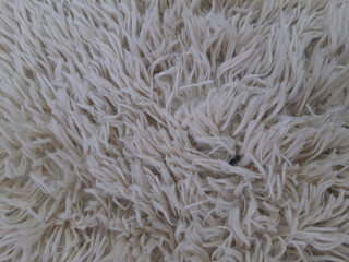 Close up of beige faux leather