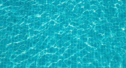 Obraz premium Rippling turquoise water surface with light reflections