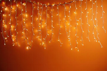 Warm, orange wall decorated with string lights