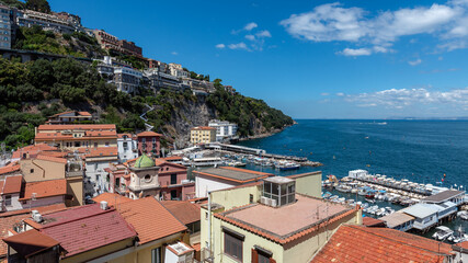 Marina Grande beach in Sorrento on a sunny summer day during Saint Anna celebrations, with festive...