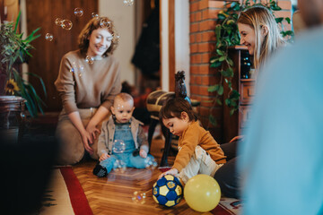 A warm family gathering in a cozy indoor space. Children play with colorful toys and bubbles, while adults happily interact, enjoying the relaxed and joyful atmosphere.