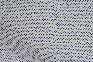 Blue polka dot fabric background