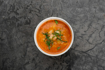 Solyanka soup in disposable containers