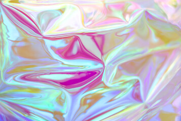 Abstract iridescent texture with soft pastel shades and shimmering tones