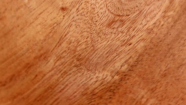 Dynamic Wood Grain Texture CloseUp of Natural Patterns and Warm Tones.
