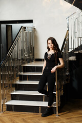 Girl on stairs indoors
