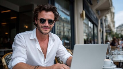 Stylish Man Working on Laptop at Outdoor Cafe for Business and Leisure
