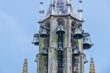 Beautiful Leaning Carillon Tower (De Speeltoren) of the old Church of Our Lady, tilting over Kleine Kerkstraat. The tower was constructed in the 15th and 16th centuries. EDAM, NETHERLANDS.