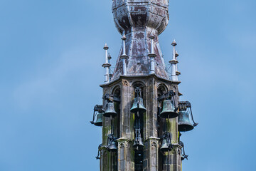 Beautiful Leaning Carillon Tower (De Speeltoren) of the old Church of Our Lady, tilting over Kleine Kerkstraat. The tower was constructed in the 15th and 16th centuries. EDAM, NETHERLANDS.