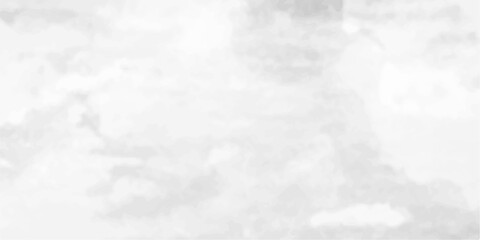 Fluffy white clouds drift across a blue sky, creating a perfect, light cloudscape background