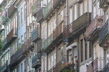 Ornate balcony facades historic center of  porto city, portugal