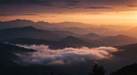 Mountain Range at Sunset with Fog
