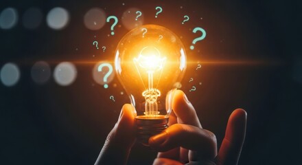 A glowing lightbulb held in a hand surrounded by question marks represents a new idea