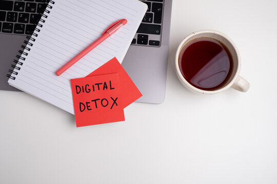 Technology concept - words of digital detox digital gadgets. Concept of social media addiction. Stop using digital gadgets at home and outside of work hours.