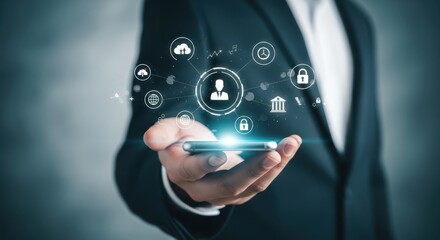 A businessman holds a mobile phone displaying various technology and internet related icons