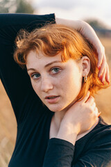 Golden Twist Hoop Earrings Close-Up Portrait