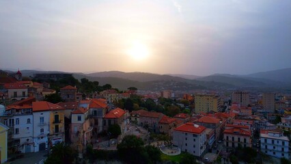 Agropoli - Italy - Aerial view over the roofs of the city with sunrise in the morning mist