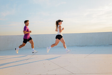 Jogging enthusiasts sharing moments of fitness on a sunny day