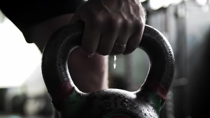 Kettlebell Workout: Sweaty Hand Grip on Kettlebell after Intense Fitness Session.