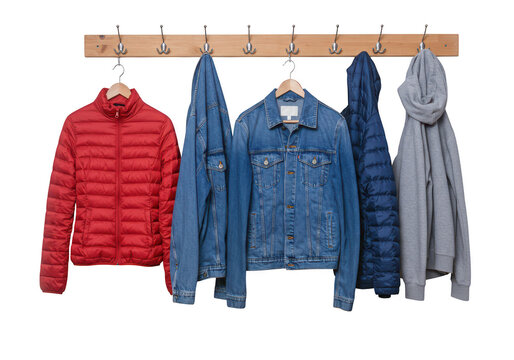 Various jackets hanging on a rack isolated on transparent background