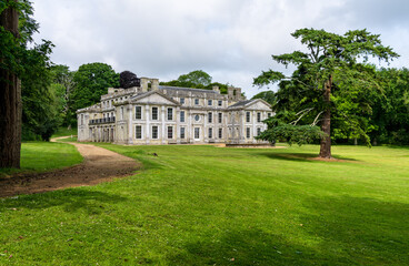 Gardens and fountain in front of the empty building shell of Appuldurcombe House near Wroxall on...