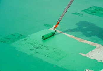 Painted flooring with green paint for waterproof, reinforcing net, Repairing waterproofing deck...