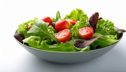 fresh green salad with mix leaves and cherry tomatoes on a white background healthy vegetarian dish rich in vitamins suitable for healthy eating and organic food themes