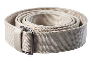 A rolled up light colored fabric belt with a silver buckle isolated on transparent background