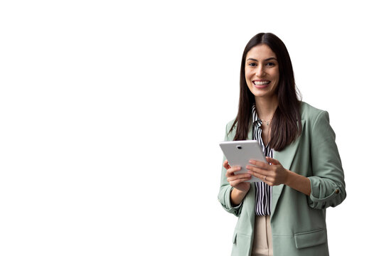 Confident businesswoman gripping tablet, wearing professional attire, standing in studio with transparent background