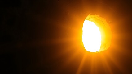 Abstract golden rays piercing through dark stone, symbolizing breakthrough ideas in a dramatic conceptual scene.