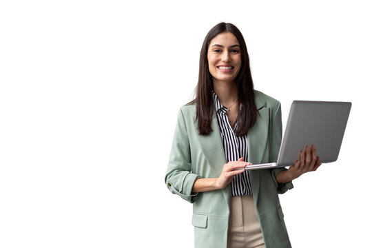 Studio shot featuring a young businesswoman smiling while holding a laptop, set against a transparent background, exuding confidence and professionalism