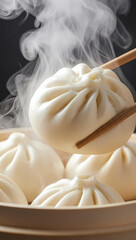 Steaming Hot Delicious Bao Buns Held by Chopsticks in Bamboo Steamer