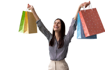 Young woman gleefully lifting multicolored shopping bags, radiating happiness and retail enthusiasm against clean white backdrop