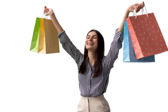 Young woman gleefully lifting multicolored shopping bags, radiating happiness and retail enthusiasm against clean white backdrop