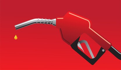 Fuel dripping from a red gas pump nozzle on red background
