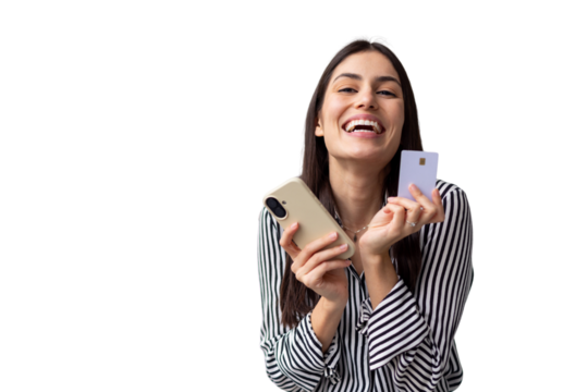 Businesswoman smiling, gripping smartphone and credit card, performing secure online shopping transaction against transparent backdrop