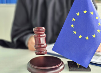 Court session in European Union with gavel and EU flag