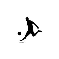 Silhouette of a soccer player in action kicking a ball.