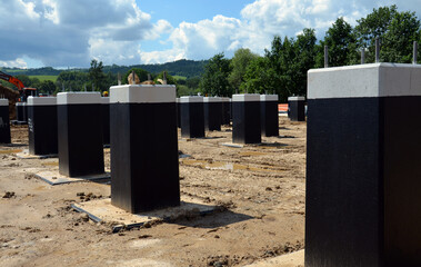 Construction site showing the foundation phase of a 110kV traction substation.