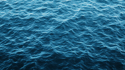 Obraz premium A serene view of ocean waves, showcasing various shades of blue and the rhythmic movement of water.