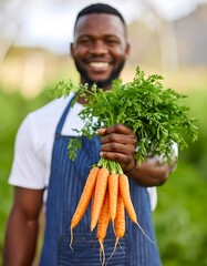 Man holding fresh carrots
