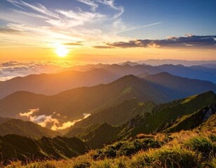 Majestic sunset illuminates a vast, layered mountain range, casting golden light on rolling hills and valleys filled with clouds.