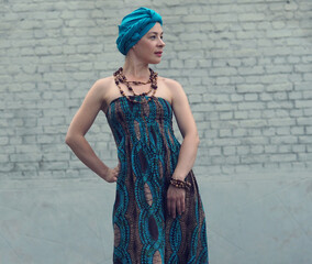 Portrait of a beautiful east woman. Woman with a turban on head.