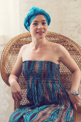 Portrait of a beautiful east woman. Woman with a turban on head.
