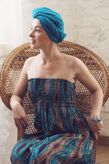 Portrait of a beautiful east woman. Woman with a turban on head.