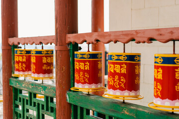 Close-up of many Tibetan prayer wheels spinning in slow motion, mongolia