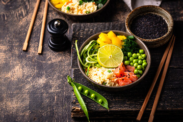 Healthy bowl with salmon and vegetables