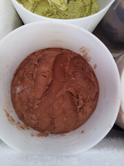 Chocolate ice cream in the ice cream shop fridge.